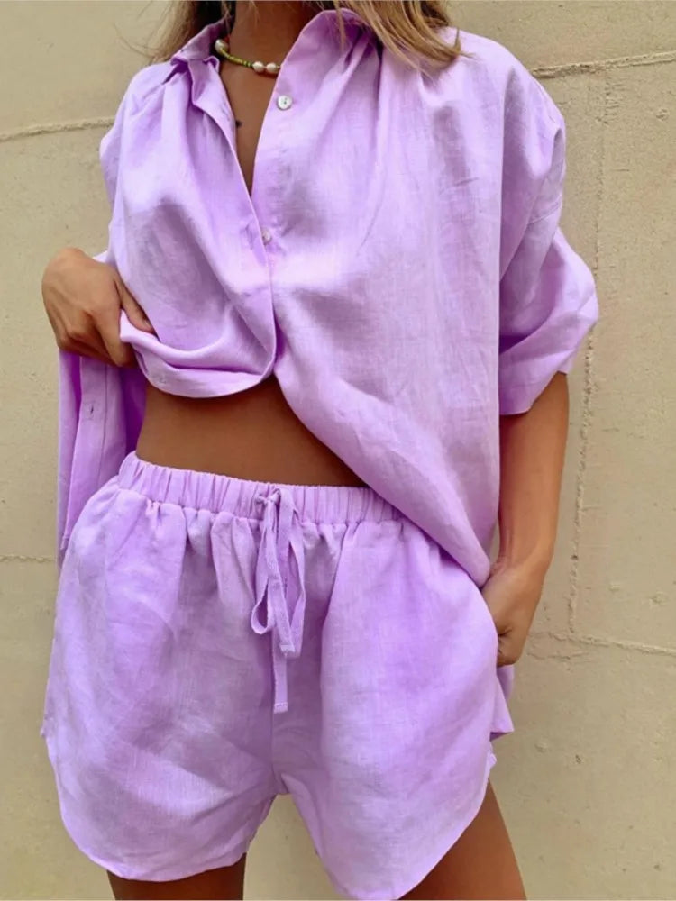 Summer casual cotton linen two-piece set featuring a loose short-sleeve shirt and matching shorts in a relaxed fit.


