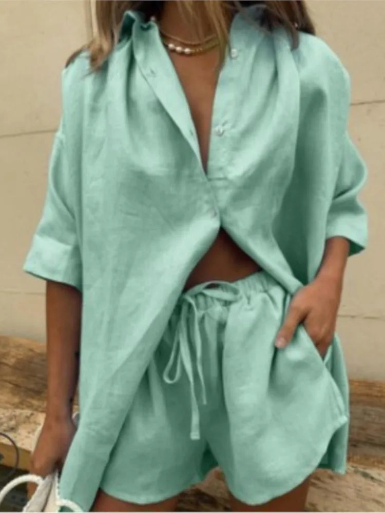 Summer casual cotton linen two-piece set featuring a loose short-sleeve shirt and matching shorts in a relaxed fit.

