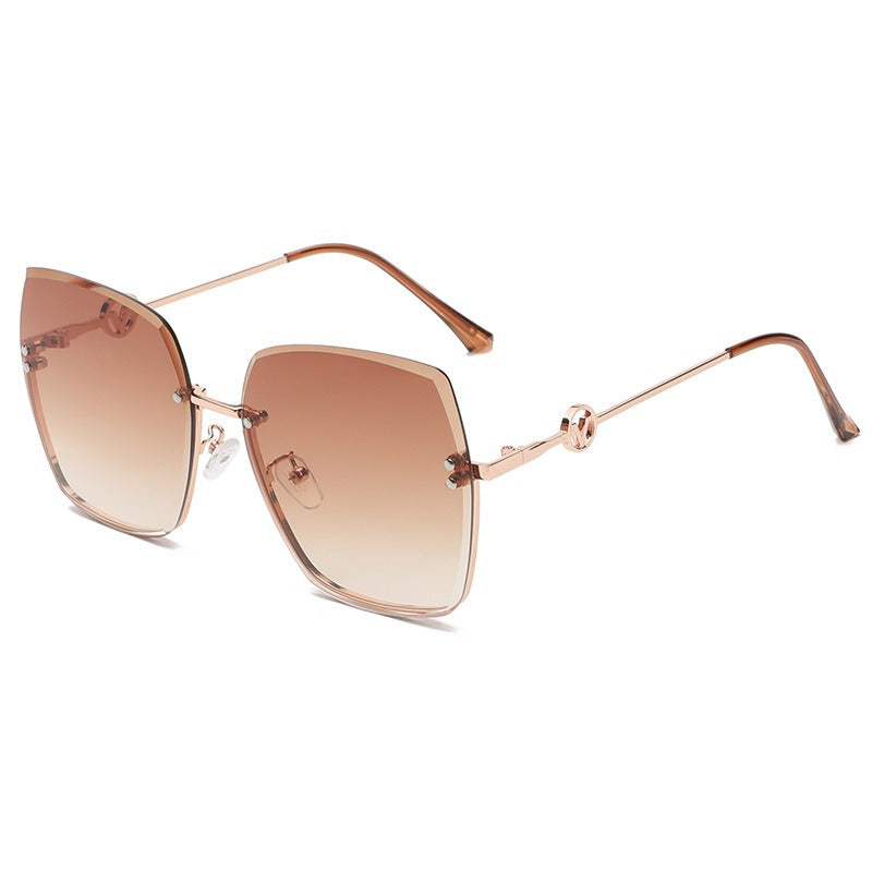 New Frameless Trimmed Sunglasses Women's Fashion Metal Large Frame Gradual Change Light Color Sunglasses Driving Sunvisors ins eprolo