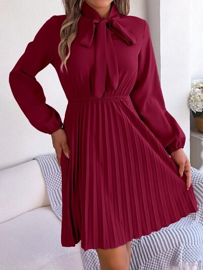 Tie Neck Balloon Sleeve Pleated Dress - House of Cardwell