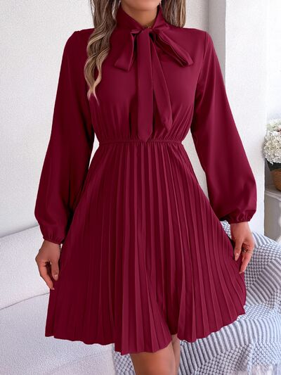 Tie Neck Balloon Sleeve Pleated Dress - House of Cardwell